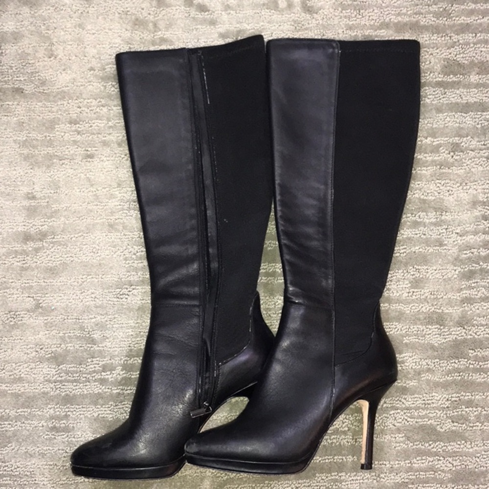 Calf high black heeled boots